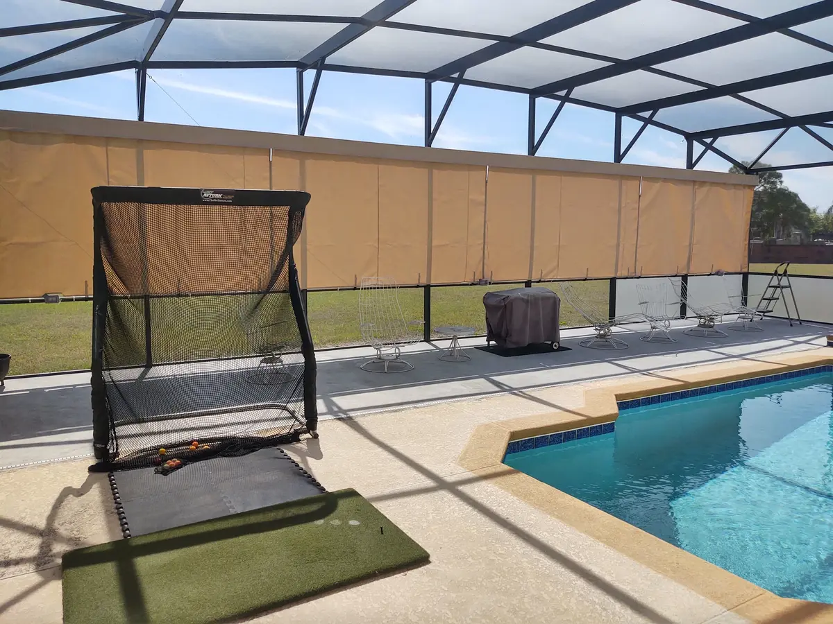 Tan privacy curtain panels for neighbor screening