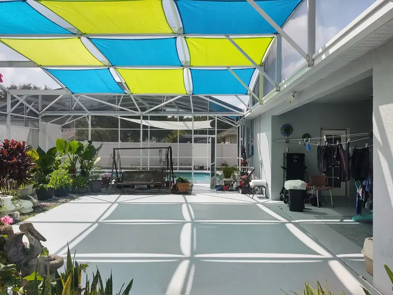 HDPE mesh shade sails for overhead sun protection in Florida pool cage enclosure
